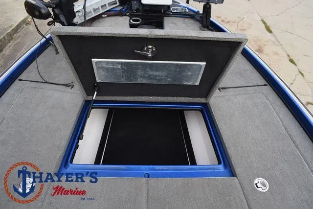 Slide: The Image of Open storage compartment on 2018 Nitro Z21 boat deck, Thayer's Marine logo visible. - 15