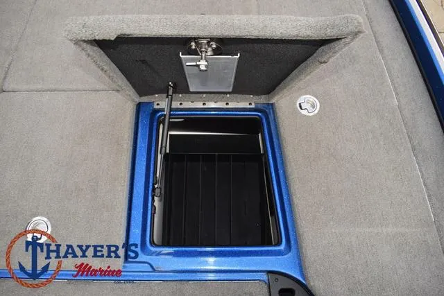 Slide: The Image of 2018 Nitro Z21 boat storage compartment with Thayer's Marine logo. - 17