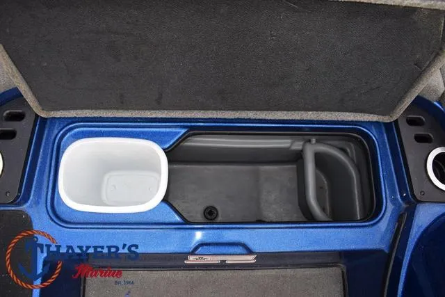 Slide: The Image of 2018 Nitro Z21 boat storage compartment with Thayer's Marine logo. - 19