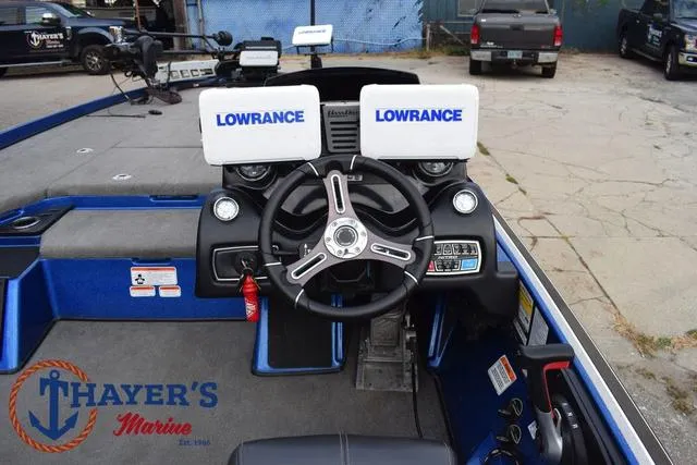 Slide: The Image of 2018 Nitro Z21 boat dashboard with Lowrance electronics and Thayer's Marine branding. - 27