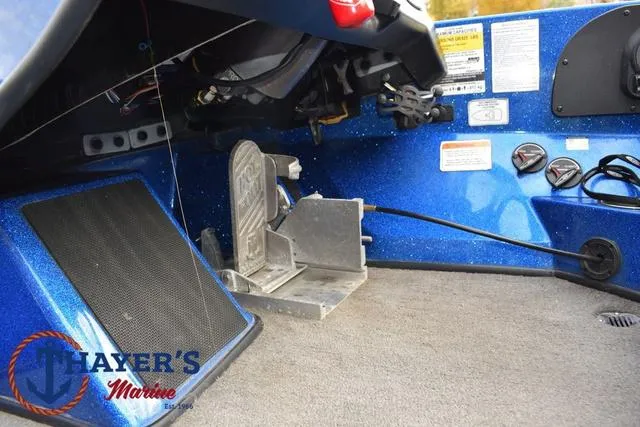 Slide: The Image of 2018 Nitro Z21 boat interior with foot pedal and control panel. - 28