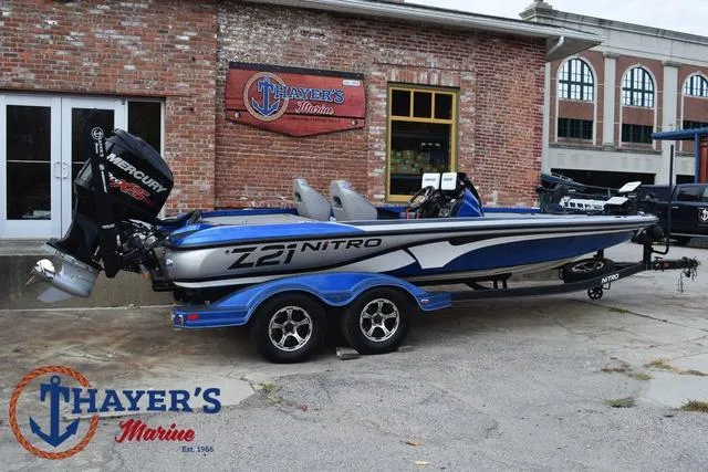 Slide: The Image of 2018 Nitro Z21 boat at Thayer's Marine dealership, featuring a Mercury engine. - 3