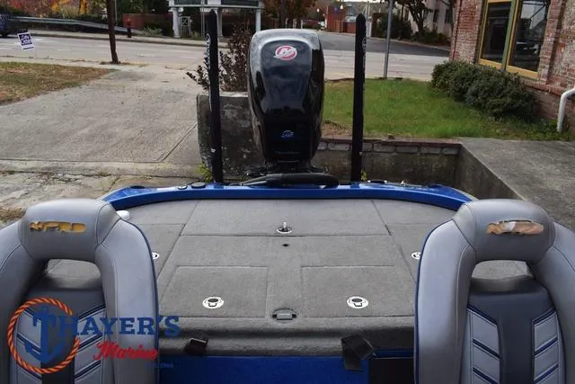 Slide: The Image of 2018 Nitro Z21 boat with Mercury engine, gray seating, and Thayer's Marine logo. - 30