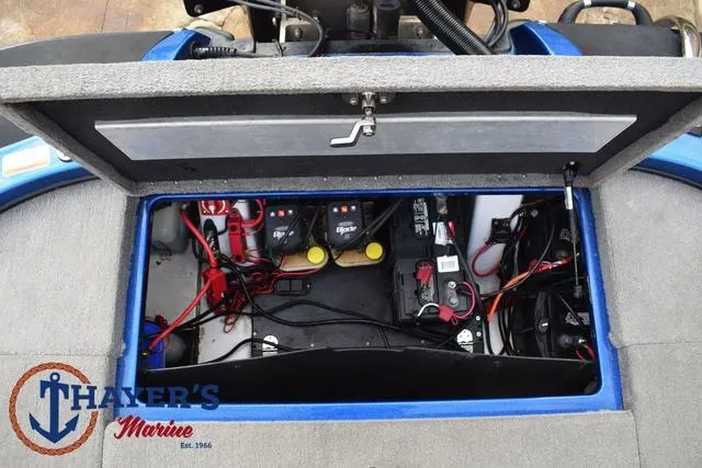 Slide: The Image of 2018 Nitro Z21 boat battery compartment with wiring and equipment. - 34