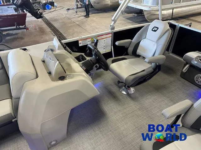 Slide: The Image of 2025 Princecraft Vectra 21 RL SS pontoon interior with captain's chair and console. - 12