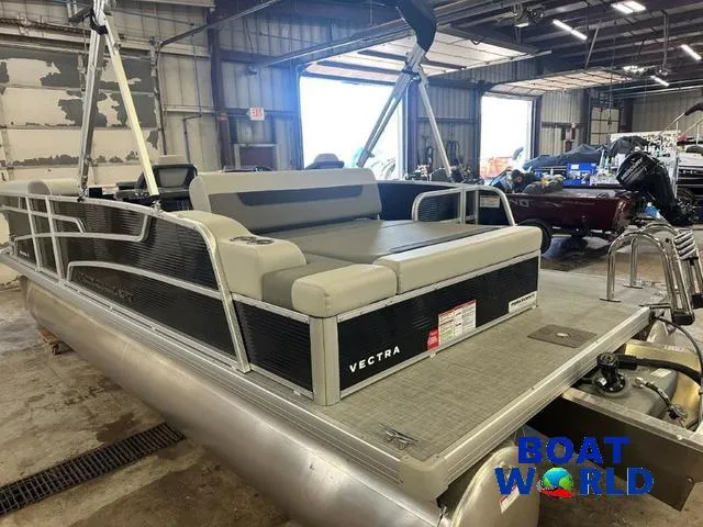Slide: The Image of 2025 Princecraft Vectra 21 RL SS Swingback Pontoon in a warehouse setting. - 38