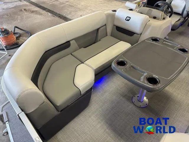 Slide: The Image of 2025 Princecraft Vectra 21 RL SS pontoon interior with seating and table. - 9