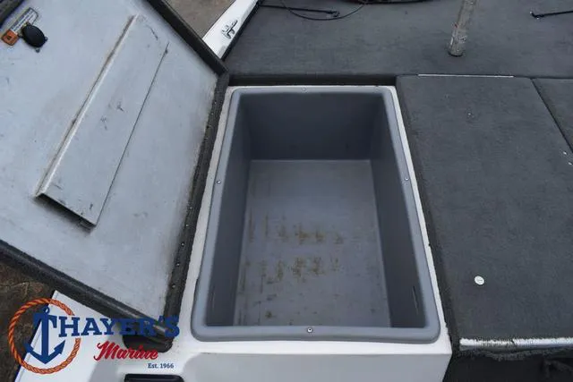 Slide: The Image of Open storage compartment on 2007 Stratos 176XT boat deck. - 14
