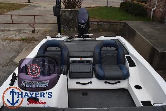 Slide: The Image of 2007 Stratos 176XT boat with dual seats and motor, displayed at Thayer's Marine. - 17
