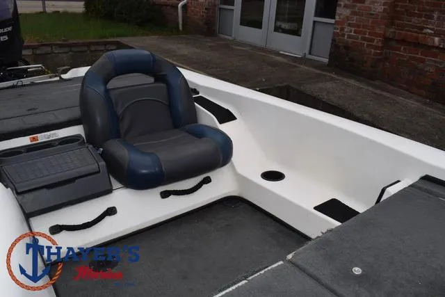 Slide: The Image of 2007 Stratos 176XT boat interior with seating and storage compartments. - 18