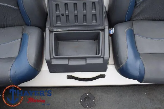Slide: The Image of 2007 Stratos 176XT boat interior with storage compartment and seating. - 21
