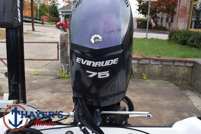 Slide: The Image of Evinrude 75 outboard motor on 2007 Stratos 176XT boat at Thayer's Marine. - 30