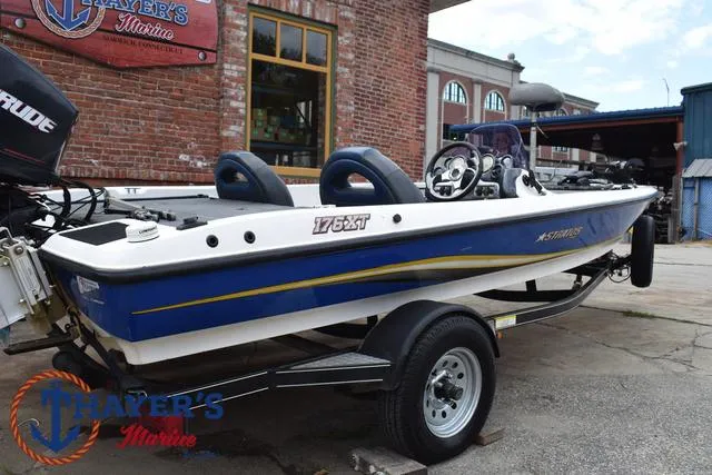 Slide: The Image of 2007 Stratos 176XT boat on trailer outside Mayer's Marine building. - 34