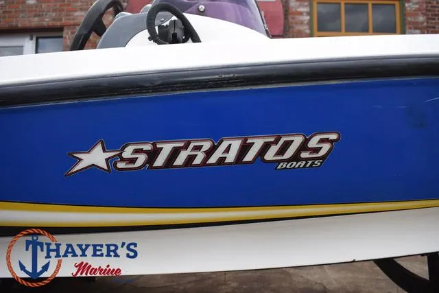 Slide: The Image of 2007 Stratos 176XT boat with blue and white design, Thayer's Marine logo visible. - 4