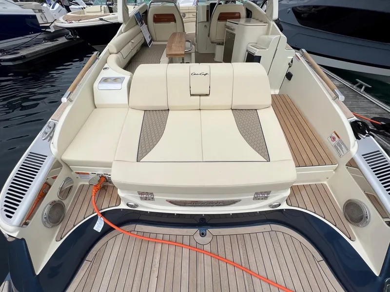 Slide: The Image of 2025 Chris-Craft Launch 35 GT luxury boat interior with elegant seating and teak flooring. - 17