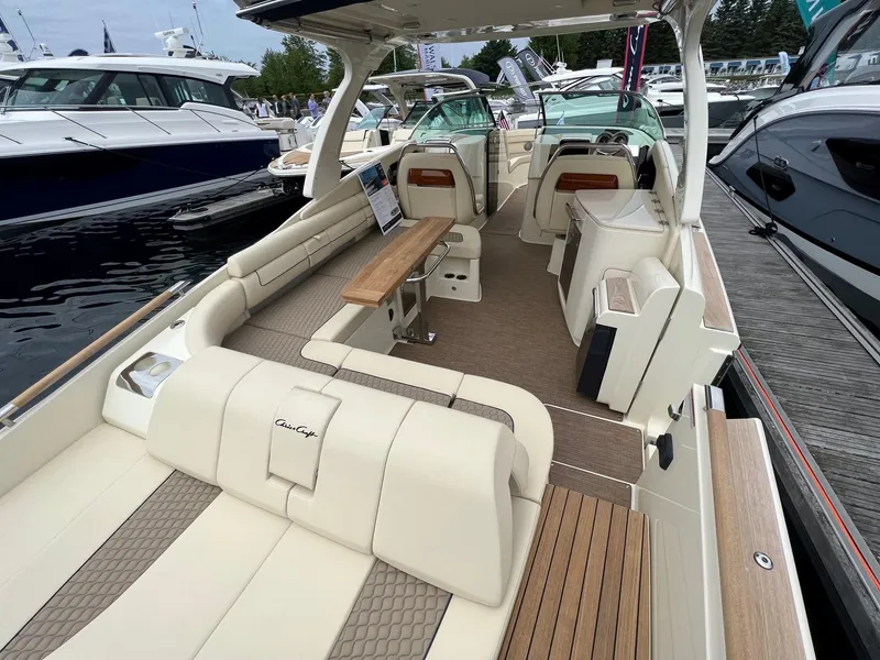 Slide: The Image of 2025 Chris-Craft Launch 35 GT luxury boat interior with elegant seating and wooden accents. - 18