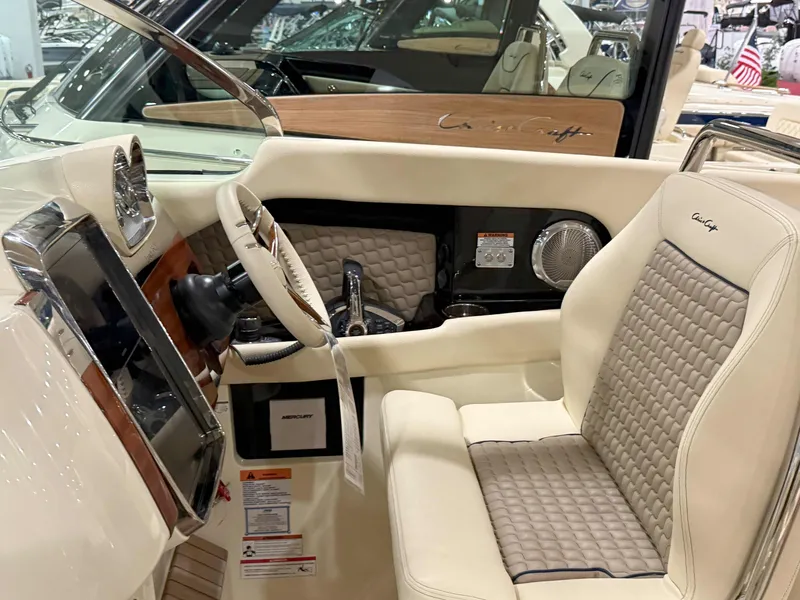 Slide: The Image of 2025 Chris-Craft Launch 35 GT interior with luxurious seating and modern dashboard design. - 7
