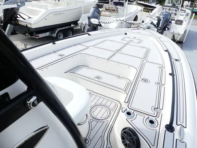 Slide: The Image of 2018 ShearWater 270 Carolina Flare boat deck with sleek design and modern features. - 15