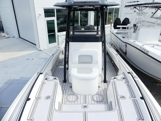 Slide: The Image of 2018 ShearWater 270 Carolina Flare boat with sleek deck design and seating. - 19