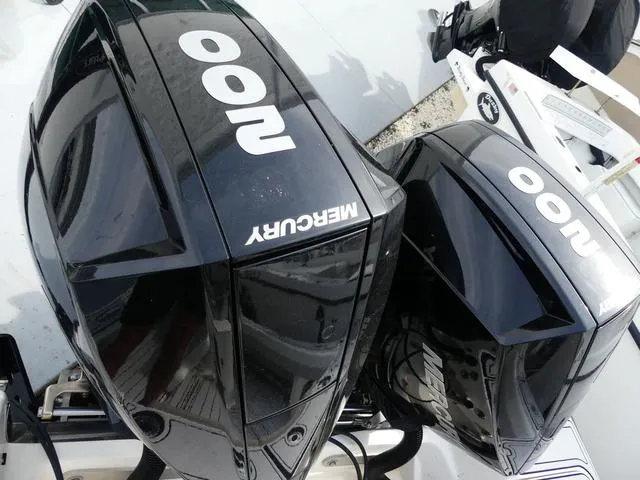 Slide: The Image of Twin Mercury 300 outboard engines on a 2018 ShearWater 270 Carolina Flare boat. - 7