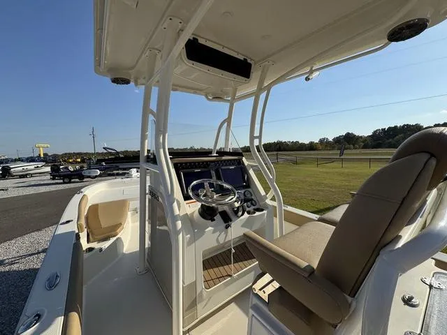 Slide: The Image of 2018 Ranger 2350 Bay boat interior with steering console and seating. - 7