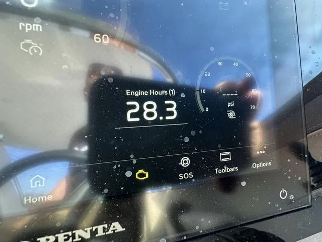 Slide: The Image of 2023 Regal LS6 dashboard displaying 28.3 engine hours and various controls. - 16