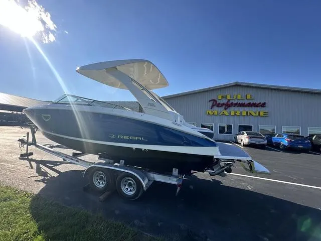 Slide: The Image of 2023 Regal LS6 boat on trailer at Full Performance Marine dealership. - 4
