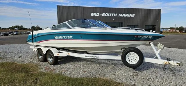 Slide: The Image of 1993 MasterCraft Maristar 225 boat on trailer at Mid-South Marine dealership. - 7