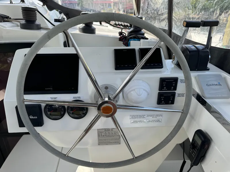 Slide: The Image of Steering wheel and controls of 2020 Fountaine Pajot Elba 45 catamaran. - 14