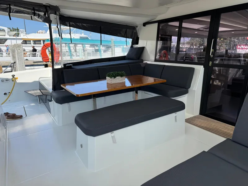 Slide: The Image of Spacious seating area on 2020 Fountaine Pajot Elba 45 catamaran with modern interior design. - 16