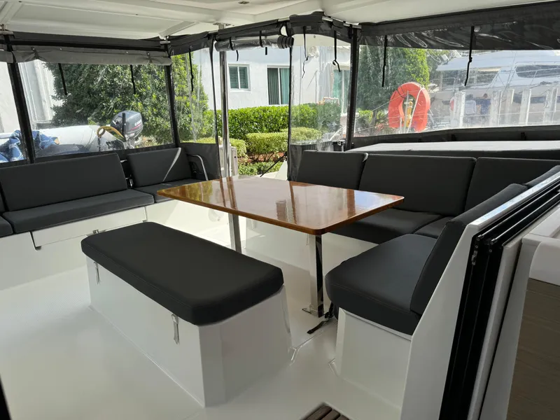 Slide: The Image of Spacious seating area on 2020 Fountaine Pajot Elba 45 catamaran with sleek design. - 17