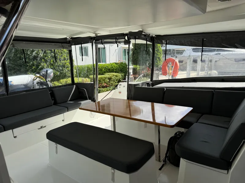 Slide: The Image of Spacious interior of 2020 Fountaine Pajot Elba 45 catamaran with seating and table. - 22