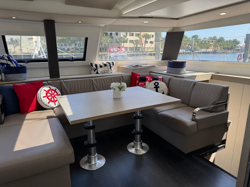 Slide: The Image of Luxurious interior of 2020 Fountaine Pajot Elba 45 catamaran with nautical-themed decor. - 25