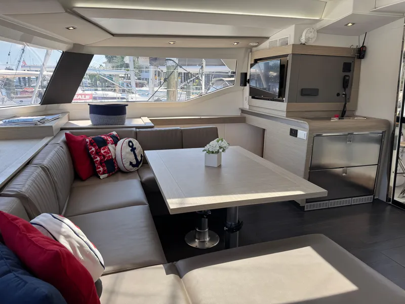 Slide: The Image of Luxurious interior of 2020 Fountaine Pajot Elba 45 catamaran with modern seating and decor. - 28