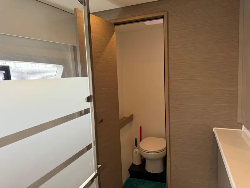 Slide: The Image of Modern bathroom on 2020 Fountaine Pajot Elba 45 yacht, featuring sleek design and amenities. - 41