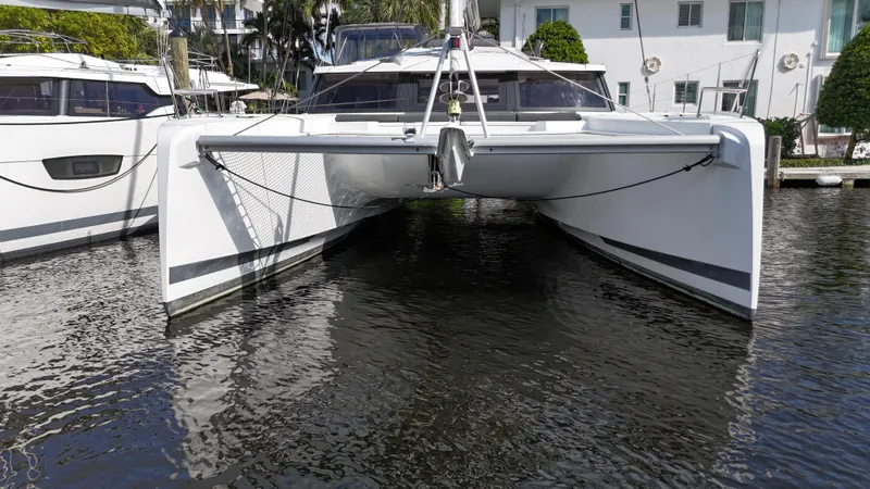 Slide: The Image of Fountaine Pajot Elba 45 catamaran, 2020 model, docked in a marina. - 6