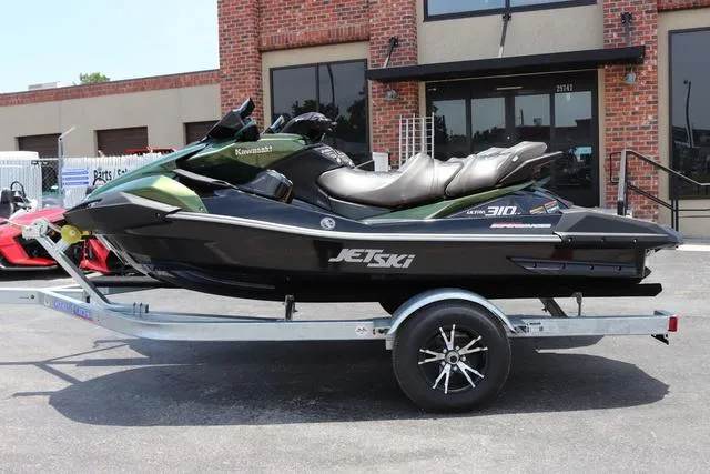 Slide: The Image of 2025 Kawasaki Jet Ski Ultra 310, sleek design, side view, green and black color scheme. - 3
