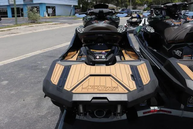 Slide: The Image of 2025 Kawasaki Jet Ski Ultra 310 with sleek design and advanced features, parked outdoors. - 5