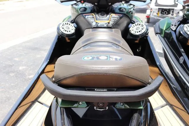 Slide: The Image of 2025 Kawasaki Jet Ski Ultra 310, rear view, showcasing seat and controls. - 8