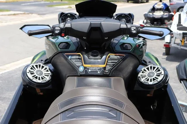 Slide: The Image of 2025 Kawasaki Jet Ski Ultra 310 dashboard and seat, featuring advanced controls and speakers. - 9