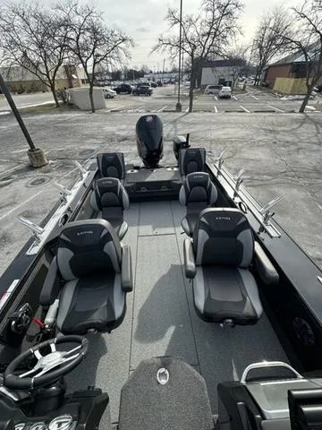 Slide: The Image of 2024 Lund 2175 Pro-V Sport boat dashboard with dual Lowrance displays. - 11