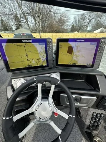 Slide: The Image of 2024 Lund 2175 Pro-V Sport boat foot pedal control on carpeted deck. - 15