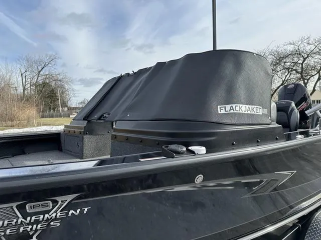 Slide: The Image of 2024 Lund 2175 Pro-V Sport boat with Flack Jacket cover, side view. - 19