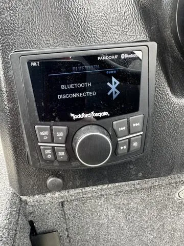 Slide: The Image of 2024 Lund 2175 Pro-V Sport boat stereo system with Bluetooth disconnected display. - 20