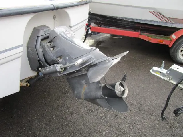 Slide: The Image of 2002 Chaparral 205SSE Cuddy boat outboard motor and propeller detail. - 6