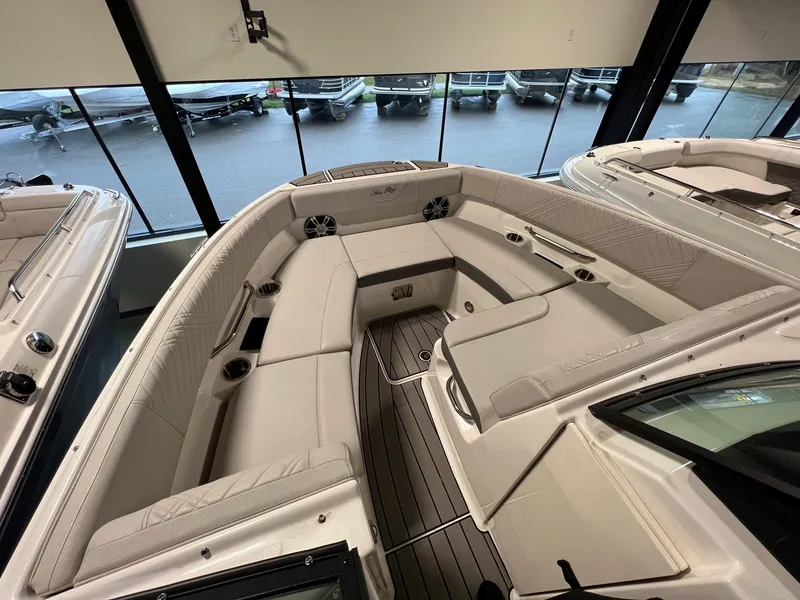 Slide: The Image of 2025 Sea Ray SDX 250 Surf boat interior with spacious seating and modern design. - 12