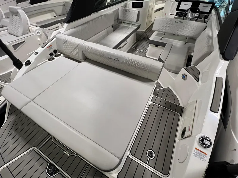 Slide: The Image of 2025 Sea Ray SDX 250 Surf boat interior with luxurious seating and modern design. - 5