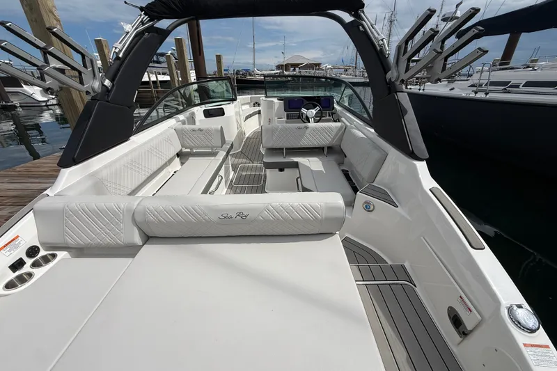 Slide: The Image of 2025 Sea Ray SDX 250 Surf boat interior with luxurious seating and modern design. - 5
