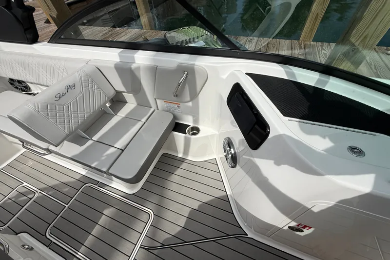 Slide: The Image of Interior of 2025 Sea Ray SDX 250 Surf boat with seating and sleek design. - 8