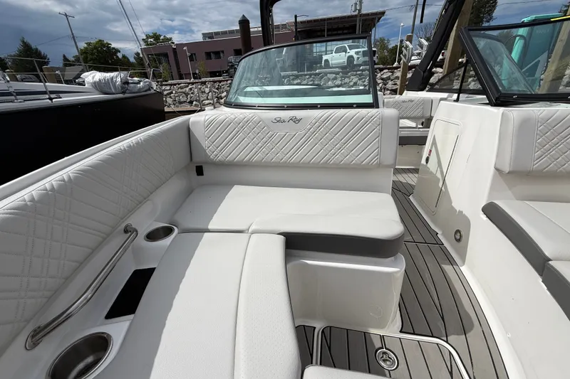 Slide: The Image of Luxurious interior of 2025 Sea Ray SDX 250 Surf boat with white seating. - 13